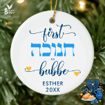 Personalized FIRST HANUKKAH AS GRANDPMA BUBBE Ceramic Tree Decoration<br><div class="desc">Stylish personalized FIRST HANUKKAH AS GRANDMA ceramic ornament which includes the Hebrew wording for HANUKKAH and GRANDMA in blue typography and small yellow hearts. Add Grandma's name for that special,  personalized touch. Design is repeated on the reverse. Saba and other versions also available.</div>