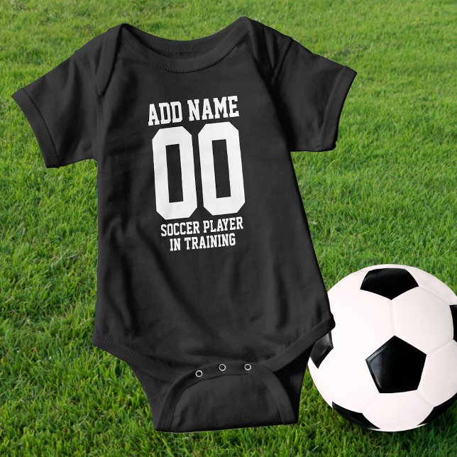 Personalized Soccer Player in Training Baby Bodysuit (Perfect for that Soccer fan family, for girl or boy. 
BALL NOT INCLUDED.)