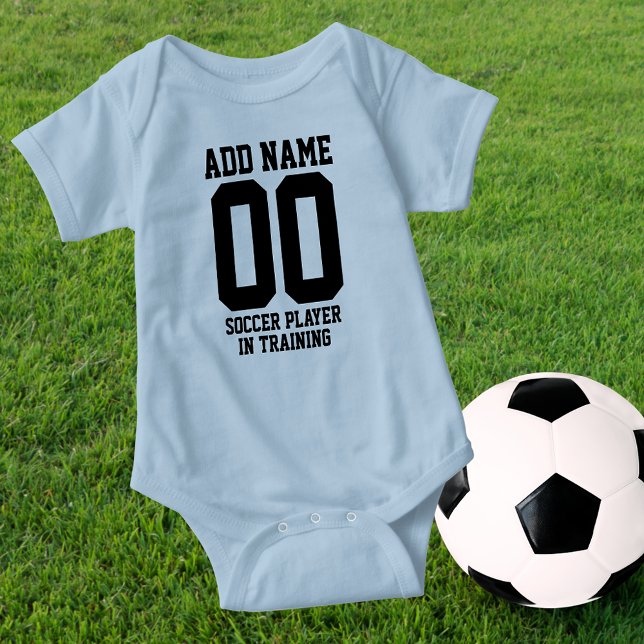 Personalized Soccer Player in Training Baby Bodysuit (Perfect for that Soccer fan family, for girl or boy. 
BALL NOT INCLUDED.)