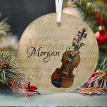 Personalized Violin Christmas Glass Tree Decoration<br><div class="desc">A violin with an elegant spray of pink poinsettias along the neck with sheet music in the background.  When personalized,  the tan and black text match creating a beautiful display for your name!</div>