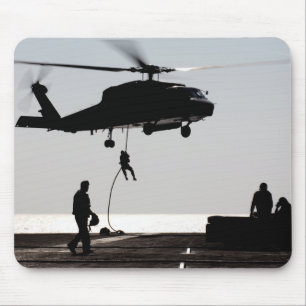 Personnel fast-rope out of an SH-60F Mouse Mat