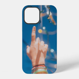 Persons hand with blue light iPhone 12 case