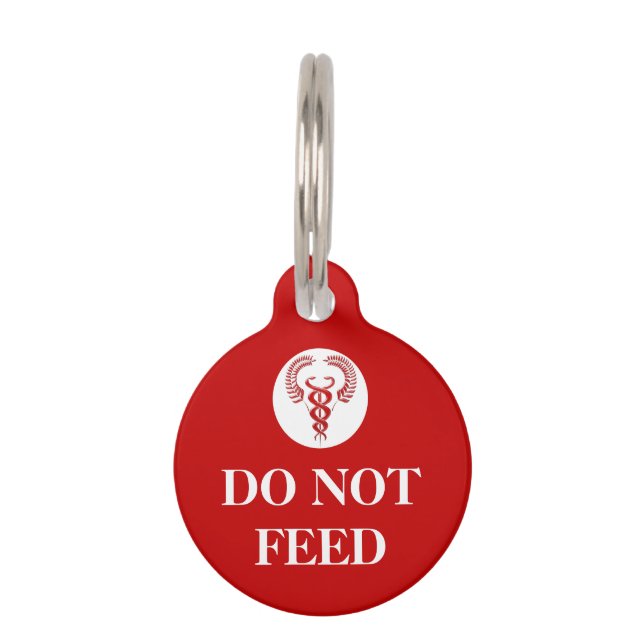 Pet health warning - do not feed caduceus tag (Front)