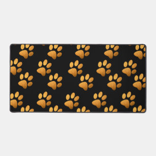 Pet paw orange glitter print on black background desk mat