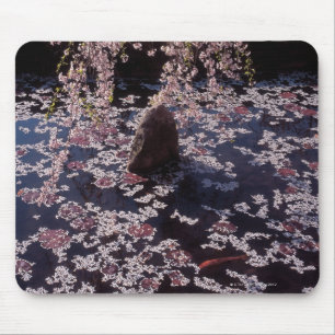 Petals floating on fish pond mouse mat