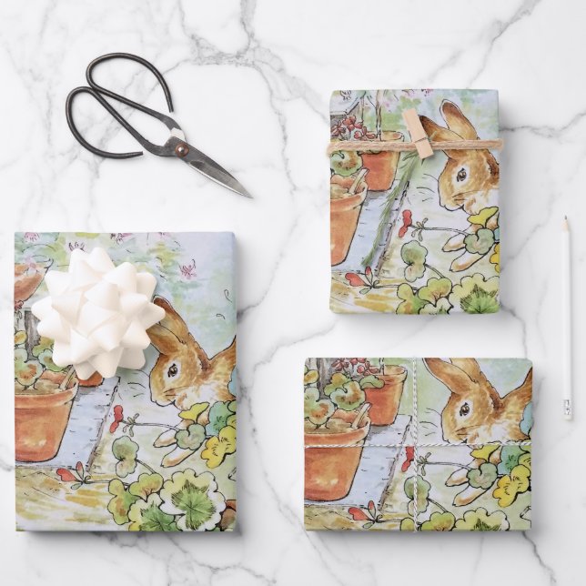 Peter the rabbit tumbling in garden shed 	 wrapping paper sheet (Front)