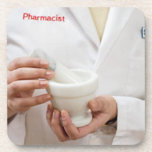 Pharmacist holding mortar and pestle coaster