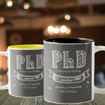 PhD graduation graduate gift chalkboard university Two-Tone Coffee Mug<br><div class="desc">This mug is a perfect gift for a successful PhD graduate from family,  friends or colleagues at the PhD defence. The unique design features a handpainted chalkboard design with the text "PhD" and a customisable text for the name,  subject and year of the graduation.</div>