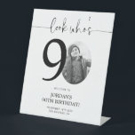 Photo 90th Birthday Welcome Sign | Look Who's 90<br><div class="desc">Welcome guests to your 90th birthday celebration with this stunning editable welcome sign. Featuring a sleek, customizable layout, this template allows you to easily add your own photo and personalize the text, making it a perfect addition to your milestone 90th birthday decor. Ideal for entryways or as a party focal...</div>