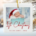 Photo Baby's First Christmas Red Script Ceramic Ceramic Ornament<br><div class="desc">Celebrate baby's first Christmas with this modern minimalist photo keepsake ornament. The red text reads "1st Christmas" in trendy handwriting script. Easily replace the sample image with your favourite photo,  and add baby's name and the year below. A white gradient screen helps make the text overlay pop.</div>