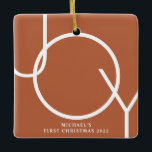 Photo Baby's First Christmas Rust Photo Ceramic Ornament<br><div class="desc">This stylish Baby's First Christmas Photo Ornament is decorated with the word JOY in white on a rust terracotta background.
Easily customisable with your photo and name.
Suitable for a boy or a girl.</div>