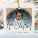 Photo Baby's First Christmas Teal Blue Script Ceramic Ornament<br><div class="desc">Celebrate baby's first Christmas with this modern minimalist photo keepsake ornament. The teal blue text reads "1st Christmas" in trendy handwriting script. Easily replace the sample image with your favourite photo,  and add baby's name and the year below. A white gradient screen helps make the text overlay pop.</div>