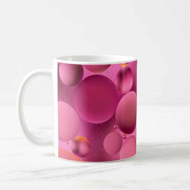 photo, bright oily drops in water with colourful b coffee mug (Left)