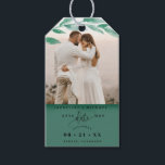 Photo, Emerald Green Leaves Wedding Save the Date Gift Tags<br><div class="desc">Delight your guests announcing your wedding date with a gift; they will love hearing the news and enjoy the nice detail! Photo gift tag with attractive watercolor green and emerald green leaves photo overlay on the top framing your photograph. Emerald green, sage section on the bottom with modern hand written...</div>