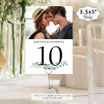 Photo Greenery Wedding Table Number Sign<br><div class="desc">Decorate your wedding reception tables with photo memories on your table number signs. These 3.5x5" signs feature a photo on each side (the same or different), names and a watercolor greenery accent. Include various photos of the bride and groom's engagement photos or dating pictures through the years to entertain guests...</div>