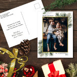 Photo in Gold Frame with Pine Branches Christmas Holiday Postcard<br><div class="desc">This simple postcard is an elegant way to send holiday greetings. It features your photo in a faux foil gold frame with hand painted watercolor pine branches in various shades of green. The title reads: Merry Christmas! with space for your family name and the year. The back has room for...</div>