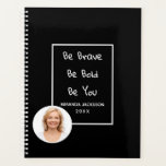 Photo motivational quote black 2026 planner<br><div class="desc">An elegant black background.  A white frame and the motivational quote,  text: Be Brave,  Be Bold,  Be You. Personalise and add your name,  year and a photo,  white letters.  Add your own photo.</div>