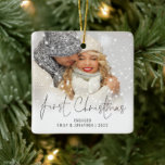 Photo Name Year First Christmas Engaged Ceramic Ornament<br><div class="desc">Photo Overlay Names Year First Christmas Engaged. To celebrate your first holiday engaged easily personalise your names and year. With an elegant set script for First Christmas. Choose your favourite photo to replace the sample picture. Changes to colours of text can be made to better suit your photo if necessary...</div>