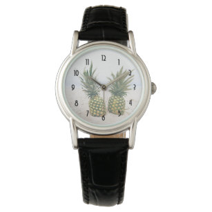 Photo of 2 Pineapples on a Beach Watch