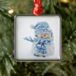 Photo of a Cute Snowman in Winter - Christmas Metal Tree Decoration<br><div class="desc">An ornament with a cute photograph of a little snowman. Standing outside in the winter with snow falling all around. This cute little guy is dressed up in blue knitted hat and scarf.</div>