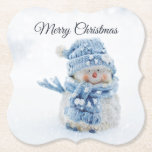 Photo of a Cute Snowman in Winter - Christmas Paper Coaster<br><div class="desc">Paper coasters with a cute photograph of a little snowman. Standing outside in the winter with snow falling all around. This cute little guy is dressed up in blue knitted hat and scarf.</div>