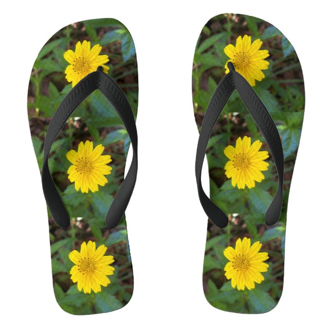 Photo of a yellow trailing daisy on flip flops (Footbed)