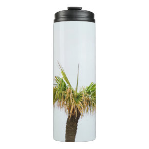 Photo of brown and green palm tree thermal tumbler