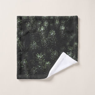 Photo of green fir plant wash cloth