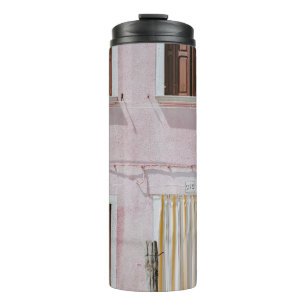 PHOTO OF PINK BUILDING WITH YELLOW DOOR CURTAIN THERMAL TUMBLER