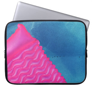Photo of pink inflatable toy laptop sleeve