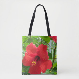 Photo of red tropical hibiscus flower on a tote bag