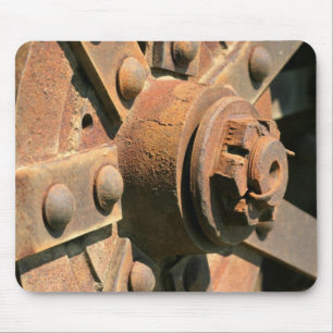 Photo of rusty old tractor wheel hub and axle mouse mat