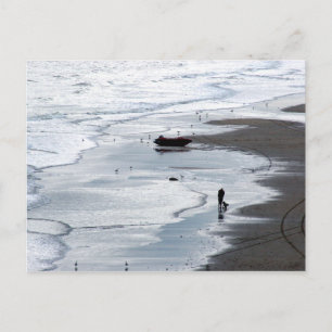 Photo of the sea coming to shore at dusk postcard