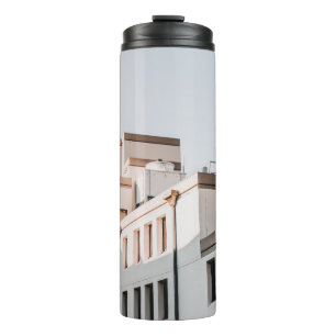 PHOTO OF WHITE CONCRETE BUILDING THERMAL TUMBLER