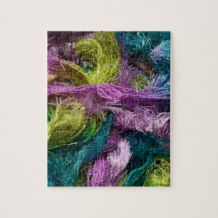 Photo of wool yarn on a jig saw puzzle