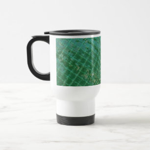 Photo picture of green plastic cover. travel mug