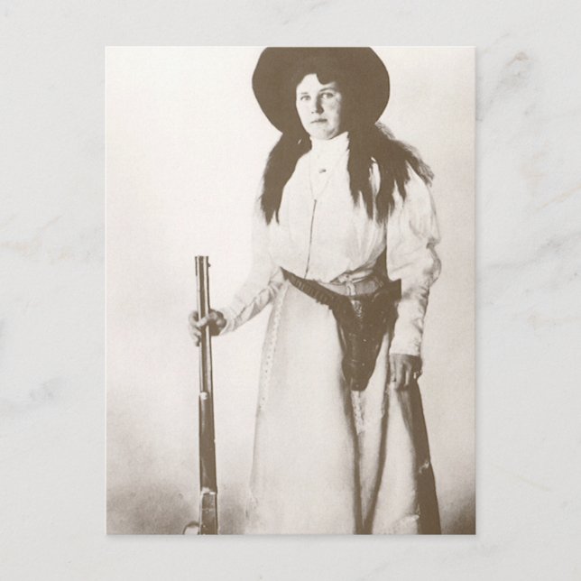 Photo Portrait of a Cowgirl Holding a Rifle, c1910 Postcard (Front)