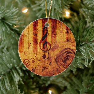 Piano keys with musical notes and rose ceramic tree decoration