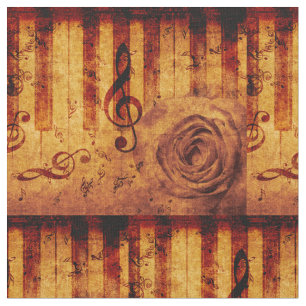 Piano keys with musical notes and rose fabric