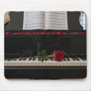 Piano with red rose and rose petals mouse mat