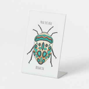 Picasso bug cartoon illustration pedestal sign