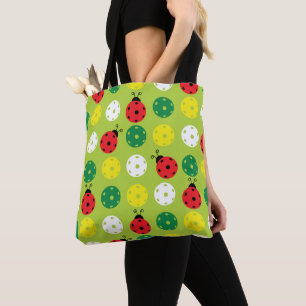 Pickleball ladybugs and pickleballs on fresh green tote bag