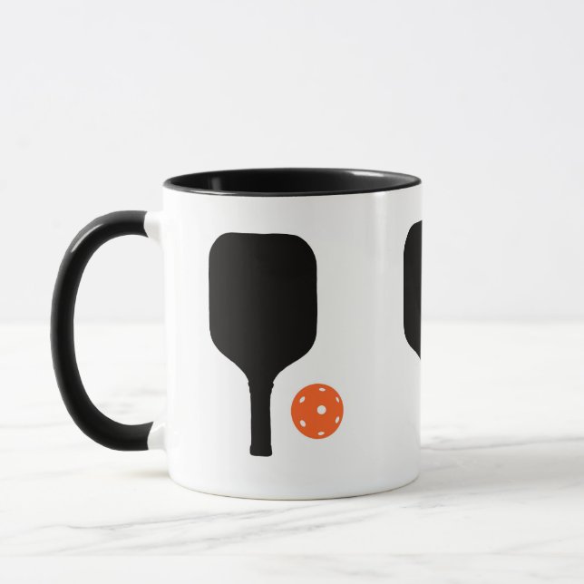 Pickleball paddle & orange pickleball mug (Left)