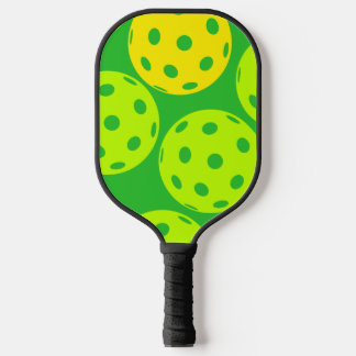 Pickleball Paddle with Pickleballs on it!