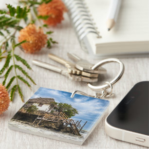 Picturesque house on a tropical coral outcrop key ring
