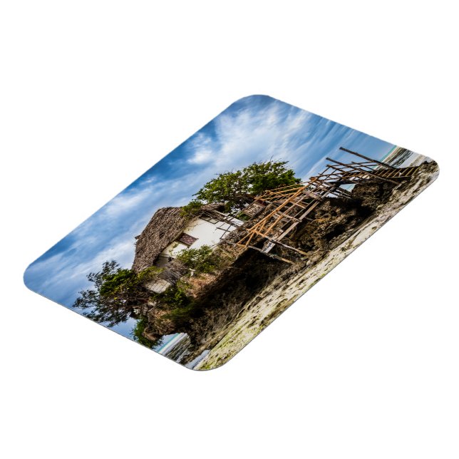 Picturesque house on a tropical coral outcrop magnet (Left Side)