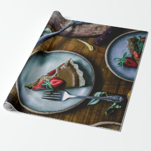 PIECE OF CAKE SERVED ON ROUND GRAY CERAMIC PLATE WRAPPING PAPER