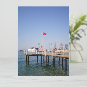 Pier with view of the marine with yacht in Turkey Invitation