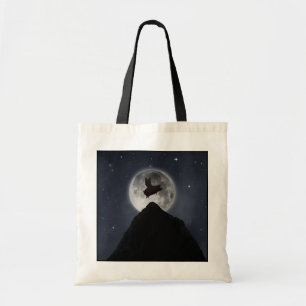 Pig flying across the full moon tote bag