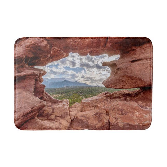 Pikes Peak Through A Rock Hole Bath Mat (Front)